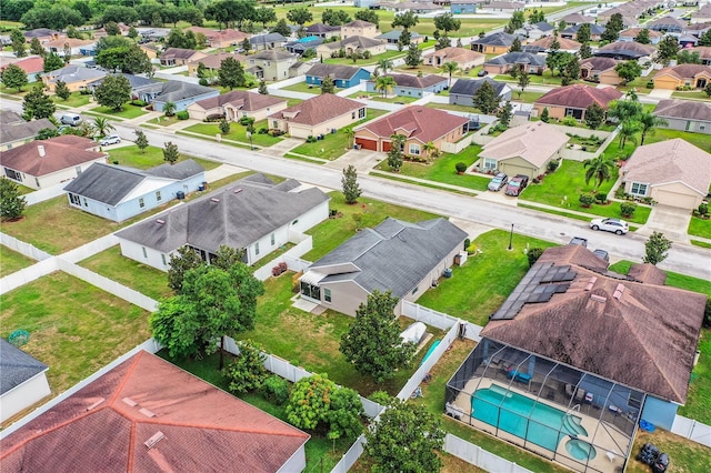 aerial perspective of suburban area with a pool