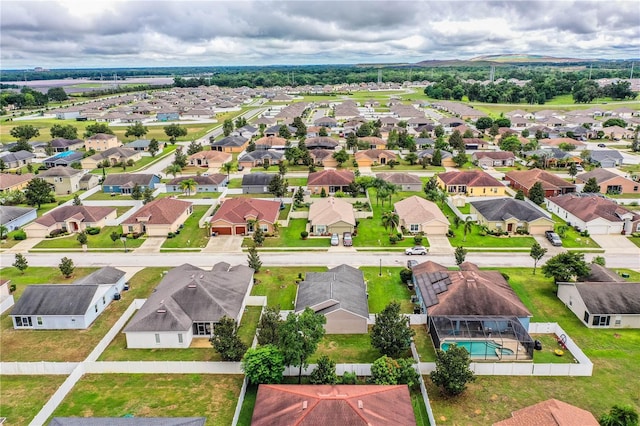 aerial view of residential area with a pool area