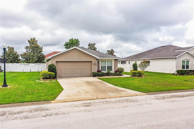 ranch-style home featuring an attached garage, stucco siding, and concrete driveway