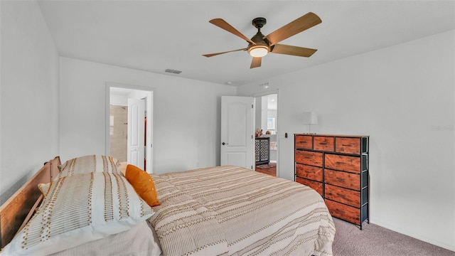 4582 Penkert Pl, Lakeland, FL 33811 - carpeted bedroom with a ceiling fan, baseboards, and ensuite bathroom