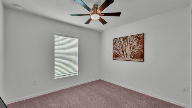 4582 Penkert Pl, Lakeland, FL 33811 - unfurnished room featuring baseboards, ceiling fan, a smoke detector, and carpet floors