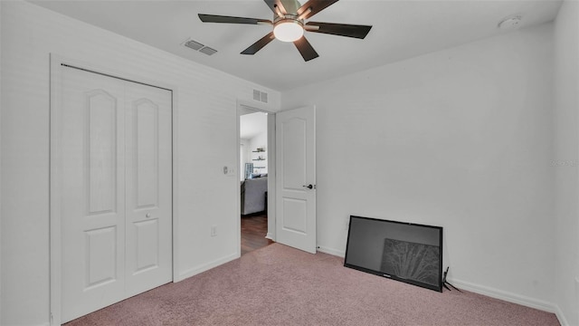 4582 Penkert Pl, Lakeland, FL 33811 - unfurnished bedroom with carpet floors, baseboards, ceiling fan, and a closet