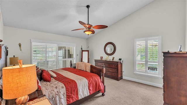 2912 Aston Ave, Plant City, FL 33566 - bedroom featuring light carpet, vaulted ceiling, baseboards, and a ceiling fan