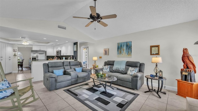 2912 Aston Ave, Plant City, FL 33566 - living room with a ceiling fan, light tile patterned flooring, vaulted ceiling, baseboards, and recessed lighting