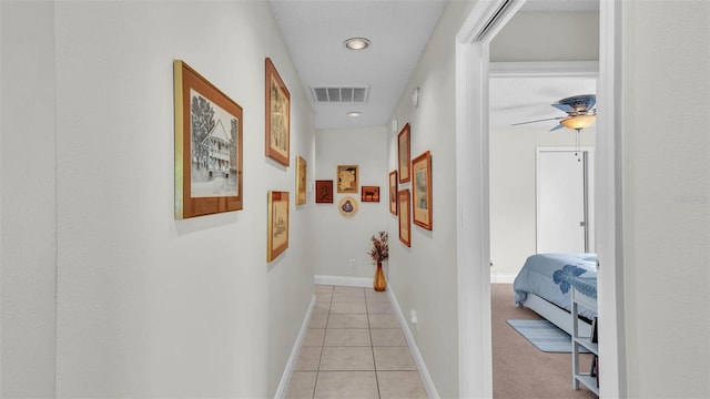 2912 Aston Ave, Plant City, FL 33566 - corridor featuring light tile patterned floors, baseboards, and recessed lighting