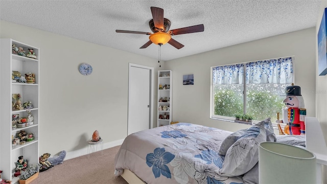 2912 Aston Ave, Plant City, FL 33566 - carpeted bedroom with a ceiling fan, a textured ceiling, and baseboards