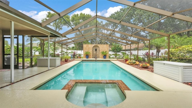 2912 Aston Ave, Plant City, FL 33566 - view of pool with a patio area, a fenced backyard, a pool with connected hot tub, and a lanai