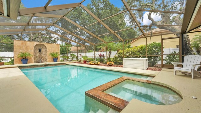 2912 Aston Ave, Plant City, FL 33566 - view of pool with a patio, a fenced backyard, and a pool with connected hot tub
