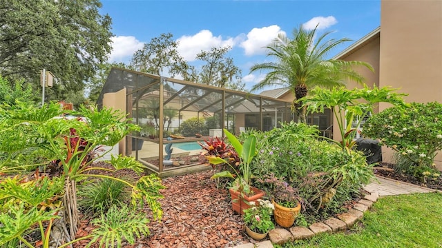 2912 Aston Ave, Plant City, FL 33566 - view of yard with an outdoor pool and glass enclosure
