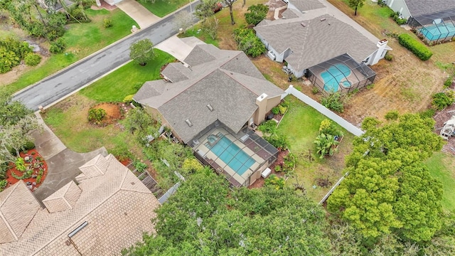 2912 Aston Ave, Plant City, FL 33566 - aerial perspective of suburban area featuring a pool area