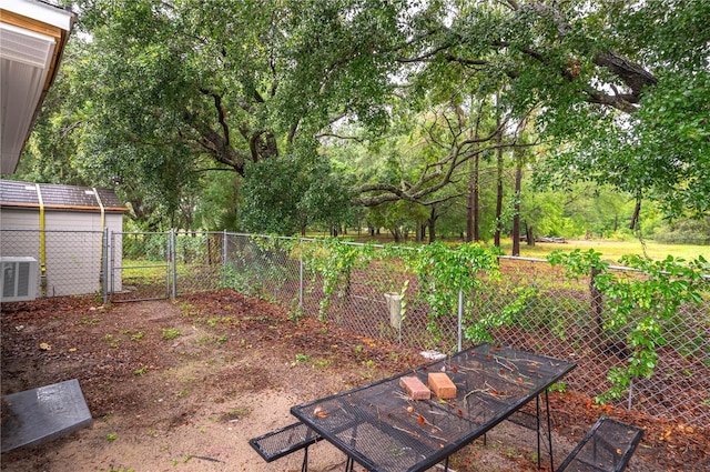409 San Jose Dr, Winter Haven, FL 33884 - view of yard with central air condition unit and fence