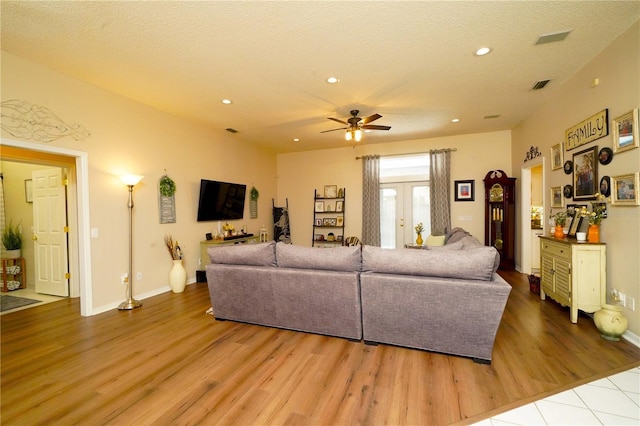 8760 Plantation Ridge Blvd, Lakeland, FL 33809 - living area featuring wood finished floors, a ceiling fan, recessed lighting, a textured ceiling, and baseboards