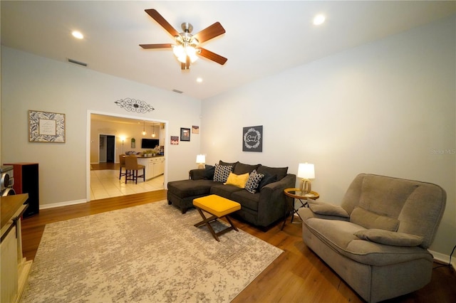 8760 Plantation Ridge Blvd, Lakeland, FL 33809 - living room with wood finished floors, ceiling fan, recessed lighting, and baseboards
