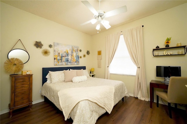 8760 Plantation Ridge Blvd, Lakeland, FL 33809 - bedroom with dark wood finished floors, baseboards, and ceiling fan