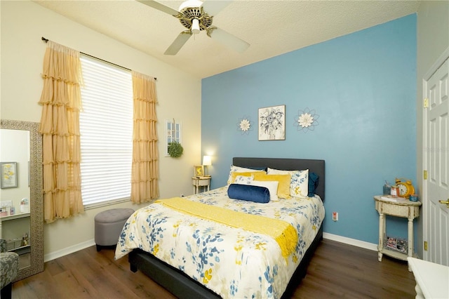 8760 Plantation Ridge Blvd, Lakeland, FL 33809 - bedroom with wood finished floors, multiple windows, and baseboards