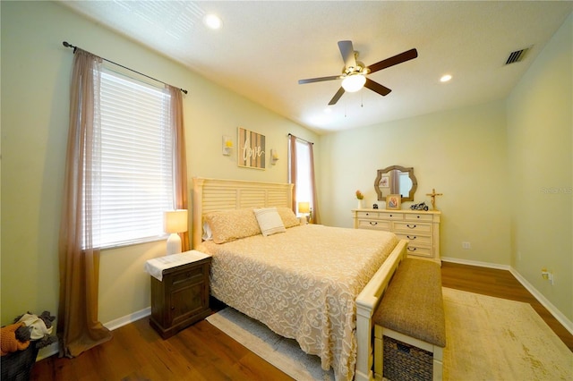 8760 Plantation Ridge Blvd, Lakeland, FL 33809 - bedroom featuring dark wood-style floors, recessed lighting, baseboards, and ceiling fan