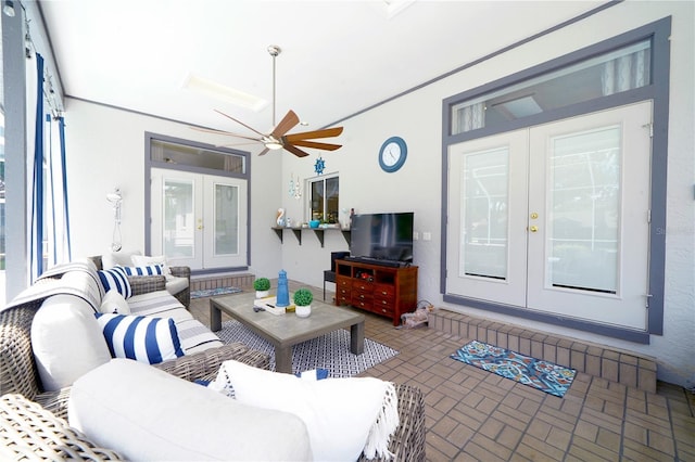 8760 Plantation Ridge Blvd, Lakeland, FL 33809 - living room with french doors, ceiling fan, and brick patterned floors
