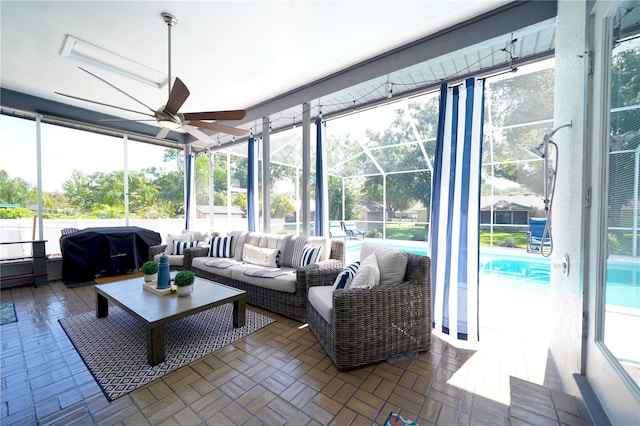 8760 Plantation Ridge Blvd, Lakeland, FL 33809 - sunroom featuring ceiling fan, an outdoor hangout area, and plenty of natural light