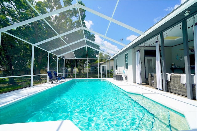 8760 Plantation Ridge Blvd, Lakeland, FL 33809 - outdoor pool with a patio area and a lanai