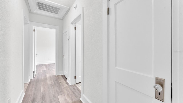 725 Ave B SW, Winter Haven, FL 33880 - hall featuring light wood-style flooring and baseboards