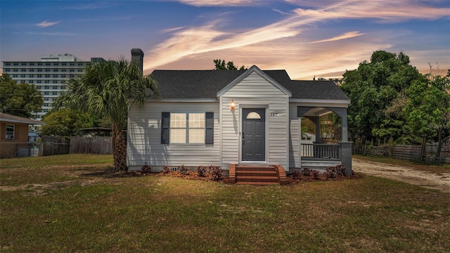 725 Ave B SW, Winter Haven, FL 33880 - view of front of home featuring a porch and a chimney