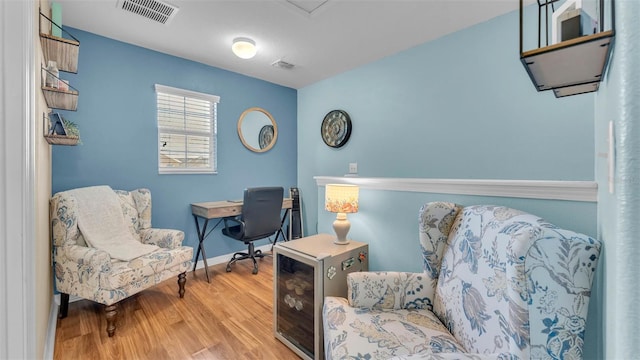 6435 Sedgeford Dr, Lakeland, FL 33811 - office with wood finished floors, wine cooler, and baseboards