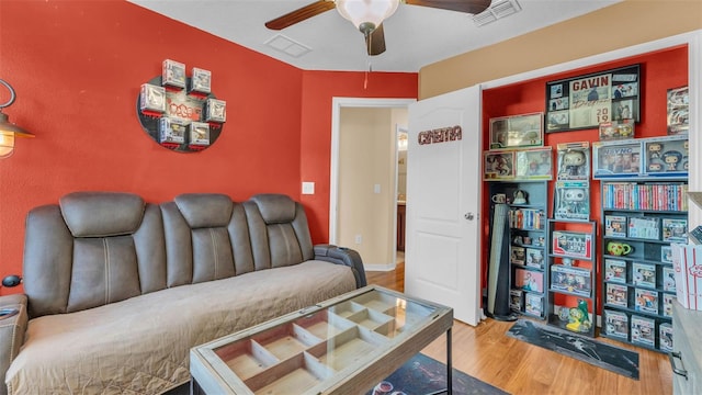 6435 Sedgeford Dr, Lakeland, FL 33811 - living room with wood finished floors and ceiling fan