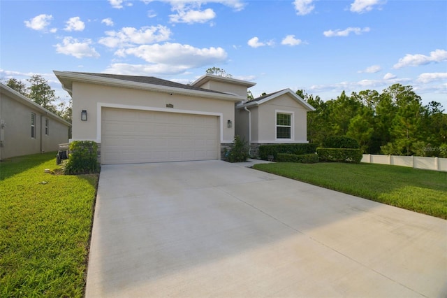 15354 Sweet Springs Bnd, Odessa, FL 33556 - view of front of home featuring driveway, stucco siding, an attached garage, and a front lawn