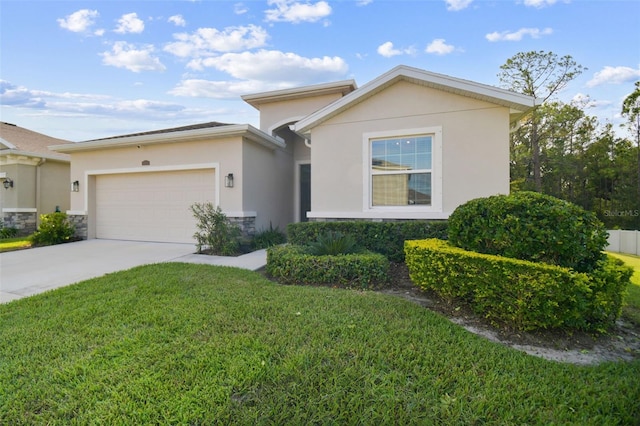 15354 Sweet Springs Bnd, Odessa, FL 33556 - view of front of home featuring an attached garage, concrete driveway, stucco siding, and a front lawn