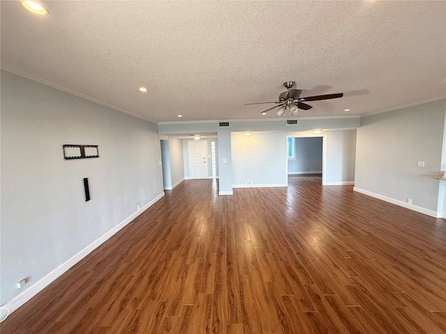 1328 Edgewater Beach Dr, Lakeland, FL 33805 - empty room featuring a ceiling fan, a textured ceiling, crown molding, baseboards, and wood finished floors