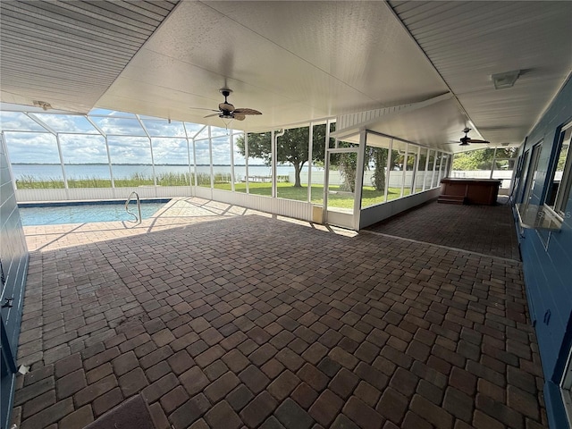 1328 Edgewater Beach Dr, Lakeland, FL 33805 - swimming pool with ceiling fan, a jacuzzi, a patio, and a lanai