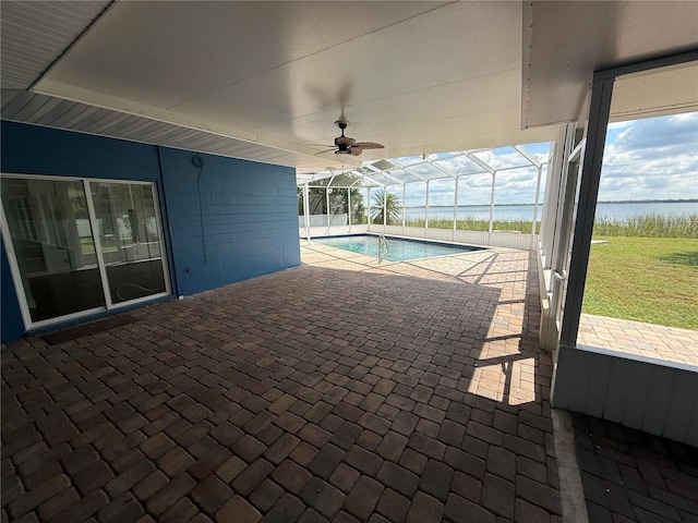 1328 Edgewater Beach Dr, Lakeland, FL 33805 - outdoor pool with a patio area, a lanai, and a water view