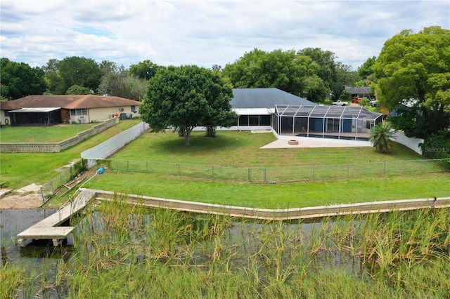 1328 Edgewater Beach Dr, Lakeland, FL 33805 - rear view of house with a lanai and a patio