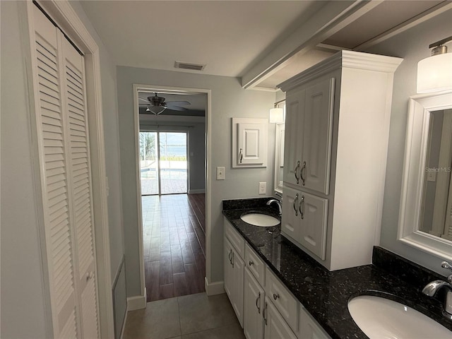 1328 Edgewater Beach Dr, Lakeland, FL 33805 - full bath with a closet, a ceiling fan, baseboards, and tile patterned floors