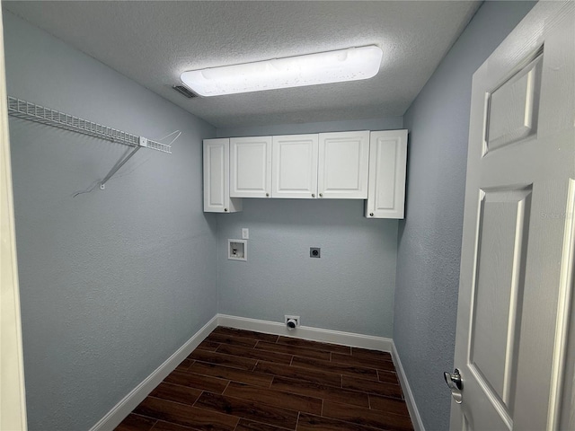 1328 Edgewater Beach Dr, Lakeland, FL 33805 - laundry room with hookup for an electric dryer, washer hookup, baseboards, wood finish floors, and cabinet space