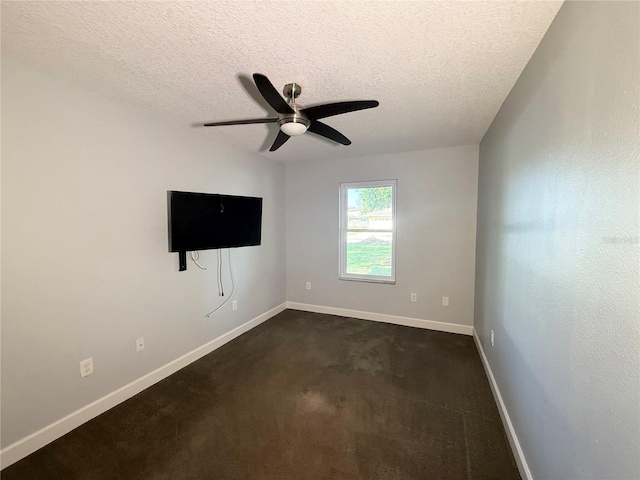 1328 Edgewater Beach Dr, Lakeland, FL 33805 - empty room with a textured ceiling, a ceiling fan, baseboards, and dark carpet