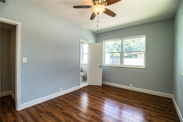 1328 Edgewater Beach Dr, Lakeland, FL 33805 - unfurnished room with a ceiling fan and dark wood finished floors
