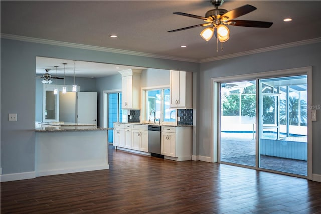 1328 Edgewater Beach Dr, Lakeland, FL 33805 - kitchen featuring dishwasher, ceiling fan, dark wood finished floors, crown molding, and recessed lighting