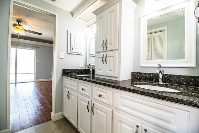 1328 Edgewater Beach Dr, Lakeland, FL 33805 - full bathroom with double vanity and a ceiling fan