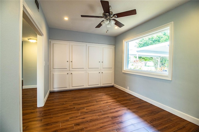 1328 Edgewater Beach Dr, Lakeland, FL 33805 - unfurnished bedroom featuring dark wood-type flooring, recessed lighting, a closet, and ceiling fan