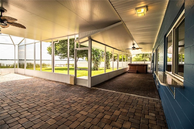 1328 Edgewater Beach Dr, Lakeland, FL 33805 - unfurnished sunroom featuring a ceiling fan and a hot tub