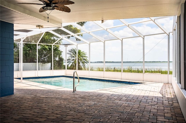 1328 Edgewater Beach Dr, Lakeland, FL 33805 - outdoor pool featuring a patio, a water view, ceiling fan, and glass enclosure