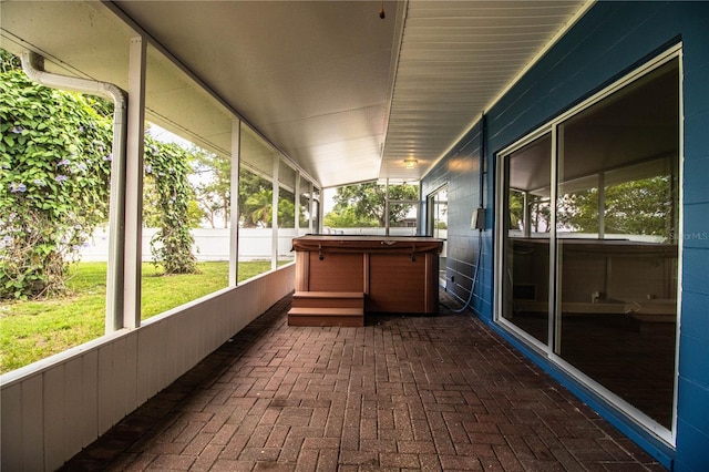 1328 Edgewater Beach Dr, Lakeland, FL 33805 - unfurnished sunroom with a hot tub