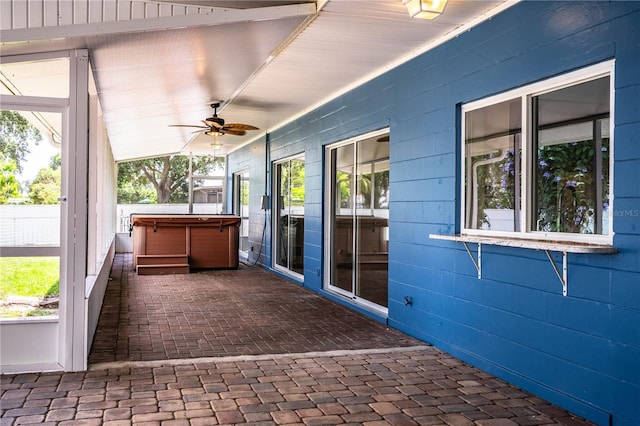 1328 Edgewater Beach Dr, Lakeland, FL 33805 - view of patio / terrace featuring a hot tub and a ceiling fan