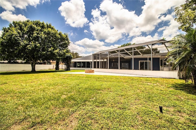 1328 Edgewater Beach Dr, Lakeland, FL 33805 - back of house featuring glass enclosure