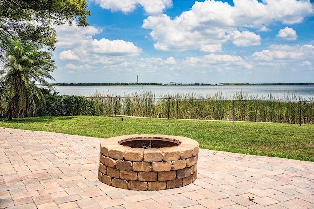 1328 Edgewater Beach Dr, Lakeland, FL 33805 - view of patio with a fire pit and a water view