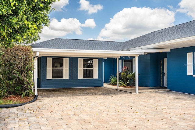 1328 Edgewater Beach Dr, Lakeland, FL 33805 - view of front of house featuring a shingled roof