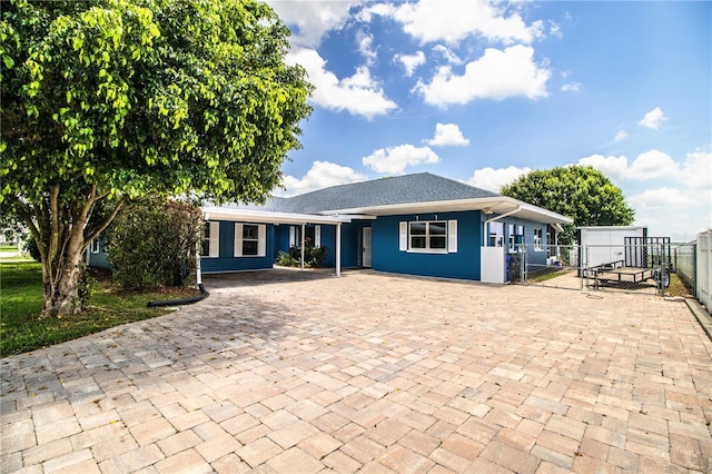 1328 Edgewater Beach Dr, Lakeland, FL 33805 - ranch-style home with a gate and driveway