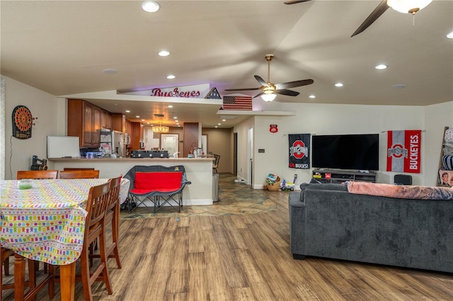 2219 New Jersey Rd, Lakeland, FL 33803 - living area featuring ceiling fan, wood finished floors, lofted ceiling, recessed lighting, and baseboards