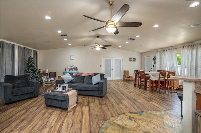 2219 New Jersey Rd, Lakeland, FL 33803 - living room with ceiling fan, recessed lighting, wood finished floors, lofted ceiling, and french doors